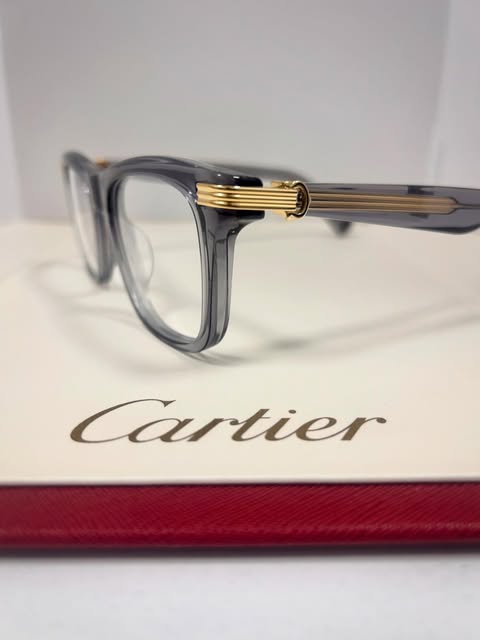 Grey acetate Cartier frames with fluted gold temple detail